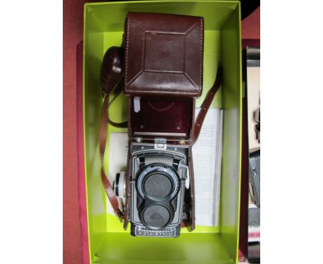 Rolleiflex T (Type 1) TLR Camera (Serial Number T2121141), leather case, lens caps, viewfinder lens Heidosmat F2.8 75mm (seri