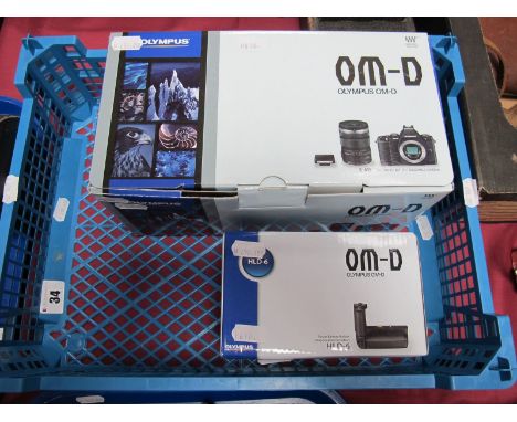 Boxed Olympus OM-D E-MS Micro Four Thirds M.Zuiko Digital Camera, together with Olympus M.Zuiko ED 12-50mm F3.5-6.3 E2 lens, 