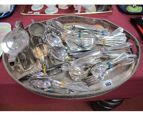 A Quantity Of Viners Electroplated Cutlery, an Embassy electroplated three piece tea service and an oval gallery tray.