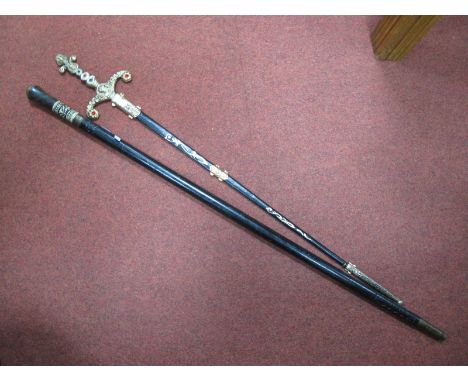 Ebonised and Bone Carved Sheffield Sword Stick, with brass lion head to end, a Spanish dress sword. (2) 