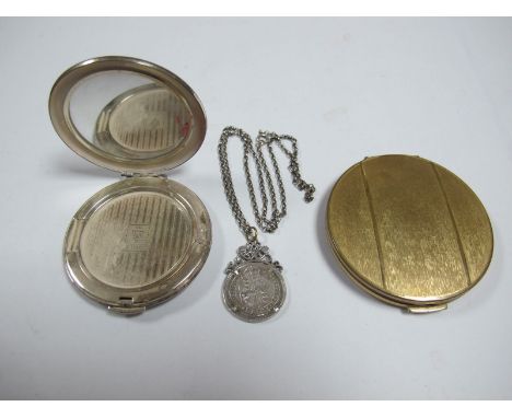 Silver Kigu Compact, having engine turned decoration, Stratton compact, silver mounted 1887 shilling in silver chain. 