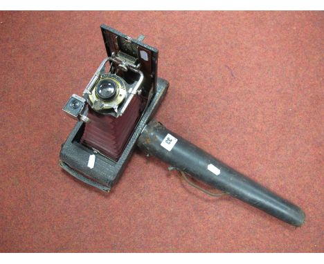 A Vintage Eastman Kodak Model TB 25 50100 Bellows Camera, the camera body and red bellows in nice condition, the casing a lit
