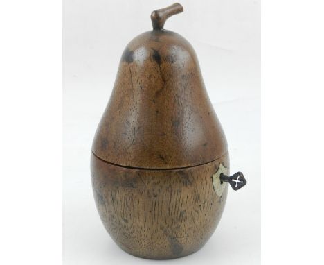 A fruitwood novelty tea caddy in the shape of a pear. 