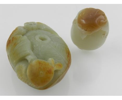 A Chinese celadon jade carving, L.7cm, together with one other celadon jade carving.