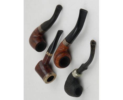 Peterson of Dublin. A Y2006 limited edition pipe, numbered 497/1000, together with three other silver mounted Peterson pipes,