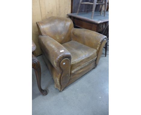 An Art Deco leather armchair 