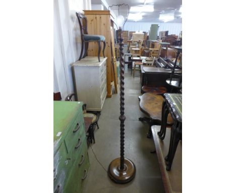 An oak barleytwist standard lamp 