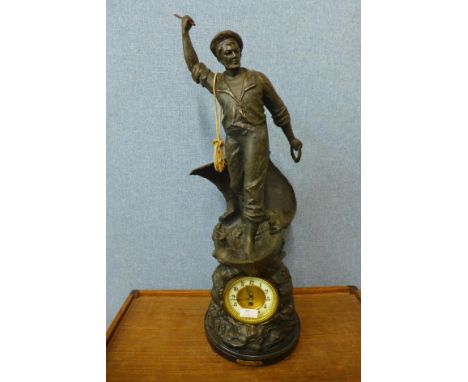 A large 19th Century spelter figural  mantel clock, titled  Cod Fishing, 75cms h 