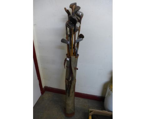 Assorted vintage golf clubs and bag 