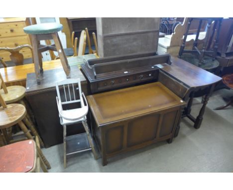 An oak gateleg table, a blanket chest, an Ercol hanging rack, etc. 