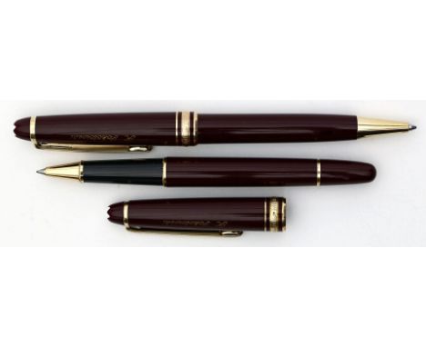 Rollerball und Kugelschreiber, "Mont Blanc". Aus der Serie "Meisterstück". Korpus und Kappe aus rotem Edelharz, Beschläge ver