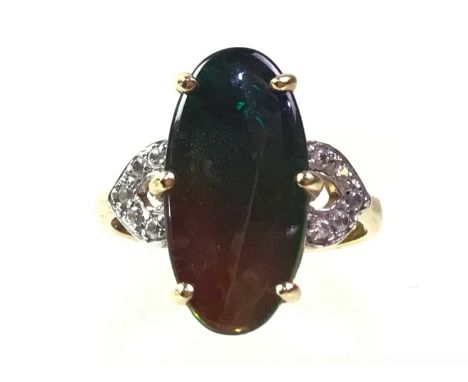 AMMOLITE PENDANT, EARRING AND RING, NINE CARAT GOLD  the marquise shaped pendant on a gold chainQty: 11.9g
