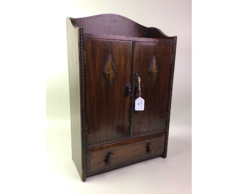 VINTAGE STAINED WOOD TABLE CABINET, fitted with two doors above a drawer36cm wide 