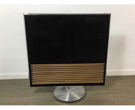 BANG & OLUFSEN 40 INCH TELEVISION, on standItem has not been tested, some minor scratches to the chrome frame, top wooden dec
