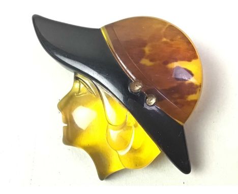 VINTAGE BROOCH, MID-20TH CENTURY  modelled as a female jockey6cm wide