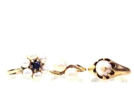 THREE PEARL DRESS RINGS, two in nine carat gold and one unmarked, size K, M, O,Qty: 13.1g gross