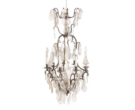A PATINATED METAL AND GLASS HUNG SIX LIGHT CHANDELIER, IN LOUIS XV TASTE,, 20th century, the electrical fitments in sockets m