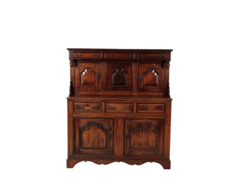 A GEORGE I OAK DUODARN CUPBOARD,, early 18th century and later elements, the gallery with three frieze drawers and twin acorn