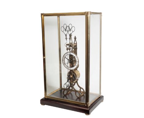 AN UNUSUAL "SCISSOR" SKELETON CLOCK, the white enamel chapter ring with Roman numerals interspersed by scissor motifs, the ha