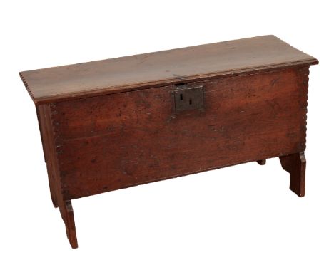 AN OAK COFFER, 19th century, the rectangular top with moulded front and notched ends, the interior with a till with hinged li