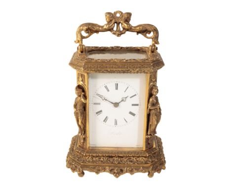 A FRENCH STRIKING CARRIAGE CLOCK,, the white enamel dial with Roman numerals, indistinctly inscribed, the movement striking o