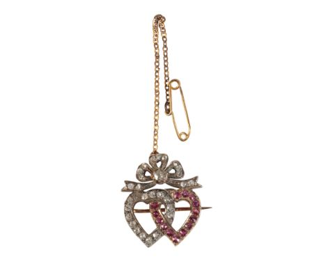 A VICTORIAN DIAMOND AND RUBY SWEETHEART BROOCH, the diamond and ruby hearts entwined, below a diamond set bow, with attached 