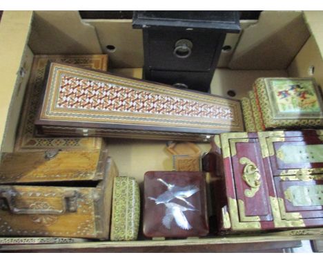 A collection of various wooden boxes to include an Asian lacquered box with mother of pearl inlaid decoration of two birds in