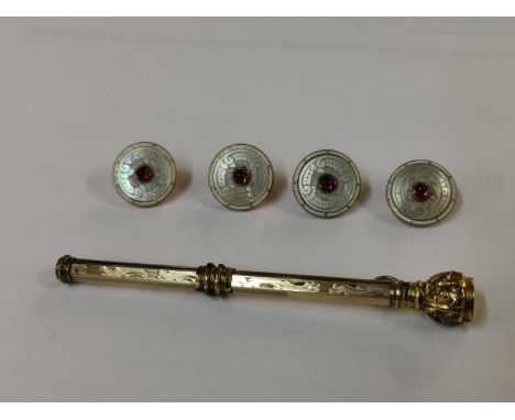 A set of four 9ct gold and mother of pearl dress studs 5.9g, together with a yellow metal propelling pencilLocation: Cab 
