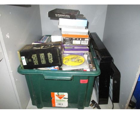 A Blue-Ray player and a DVD player along with various DVDs and CDs and a wii console with various gamesLocation: G 
