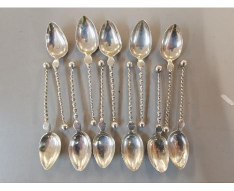 A set of eleven sterling silver spoons, 87gLocation: Cab 