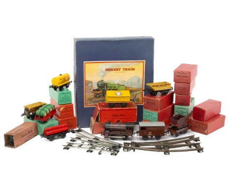 HORNBY TRAINS O GAUGE NO.601 GOODS SET, engine 5600 with three wagons, clock work, tin plate, original box together with 17 b