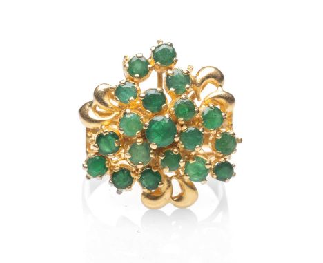 YELLOW METAL EMERALD CLUSTER RING, stamped '22K', ring size T 1/2, 10.0gmsProvenance: deceased estate Neath Port Talbot Count