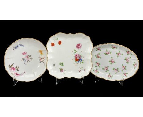 THREE VARIOUS SWANSEA PORCELAIN CRUCIFORM DISHES oval (28cms), square (23cms) and circular (22.5cms diam.), the oval with a f