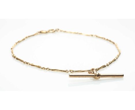 9CT YELLOW GOLD FANCY LINK ALBERT, with associated running rose gold T-bar and ring clasps, 34cms, 11.2gProvenance: private c