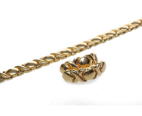 18KT GOLD BRACELET, of circle and X alternating design, 19cms long, together with matching yellow metal earrings, 22.3gms gro