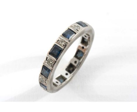 14CT WHITE GOLD, DIAMOND & SAPPHIRE ETERNITY RING, alternately set with 11 square cut sapphires and 11 small round brilliant 