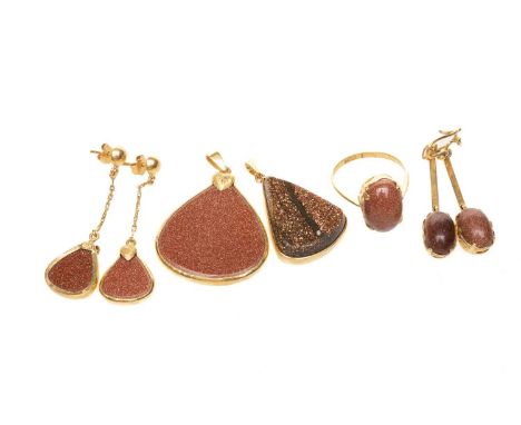 GROUP OF GOLDSTONE ITEMS OF JEWELLERY comprising ring, two pendants and pair of earrings stamped '22K', together with an unma