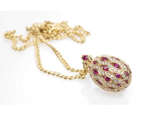 18CT GOLD RUBY & DIAMOND ENCRUSTED PENDANT, stamped 'Pravins' and '750' on 9ct gold chain, 7.2gmsProvenance: Torfaen County B