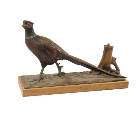 AUSTRIAN COLD PAINTED FIGURAL TABLE CIGAR LIGHTER, modelled as a striding cock pheasant, on plinth base, 31cms (w)Provenance: