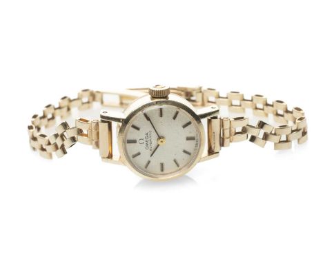 9CT GOLD LADY'S OMEGA AUTOMATIC WRISTWATCH, the circular dial with hour baton markers, inner back cover signed, hallmarked an