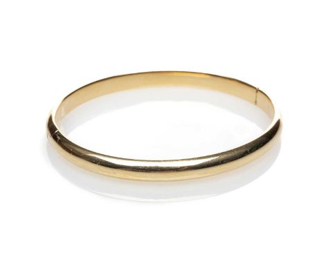 18CT GOLD HINGED BANGLE, stamped '750', 10.6gmsProvenance: Torfaen County Borough Comments: good overall, clasp working well,