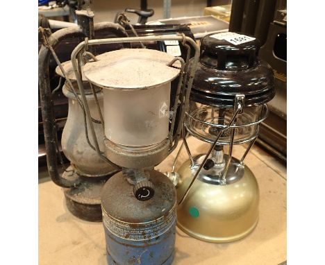 Three vintage handheld lanterns including Tilley and Gaz. Not available for in-house P&amp;P, contact Paul O'Hea at Mailboxes