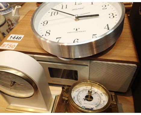 John Lewis cello HI-FI music system, Amms radio controlled clock, barometer and quarts London company display clock. Not avai