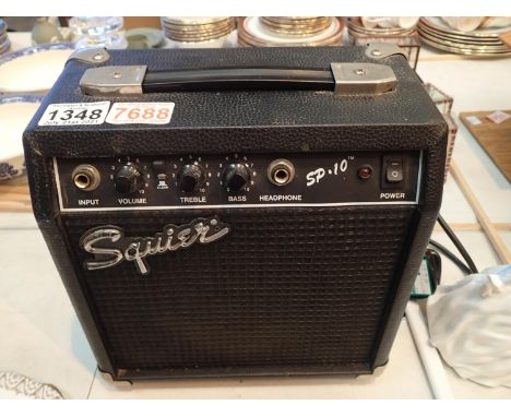 Squier SP-10 amplifier. P&P Group 3 (£25+VAT for the first lot and £5+VAT for subsequent lots)Condition Report: All electrica