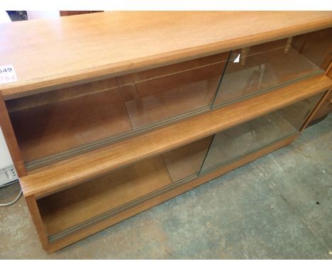 Light oak dressing table and a glass sliding door bookcase, 122 x 22 x 69 cm H. Not available for in-house P&amp;P, contact P