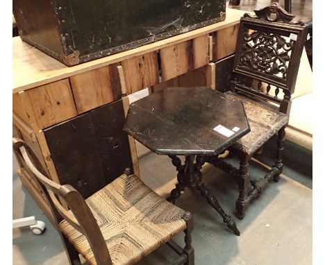 Painted black oak games table on a tripod base with a vintage decorated oak chair and cane spring seated chair. Not available