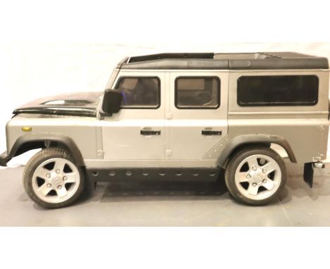 Childs plastic Land Rover Defender battery powered car. Not available for in-house P&P, contact Paul O'Hea at Mailboxes on 01