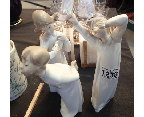 Three Lladro figurines, one with missing lute end. P&amp;P Group 2 (£18+VAT for the first lot and £3+VAT for subsequent lots)