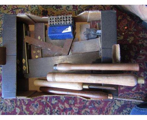 a box of wood work tools including steel stamps