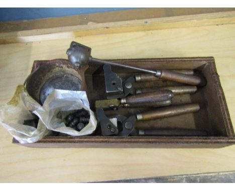 A box of musket balls and moulds, melting pot and pouring ladle etc